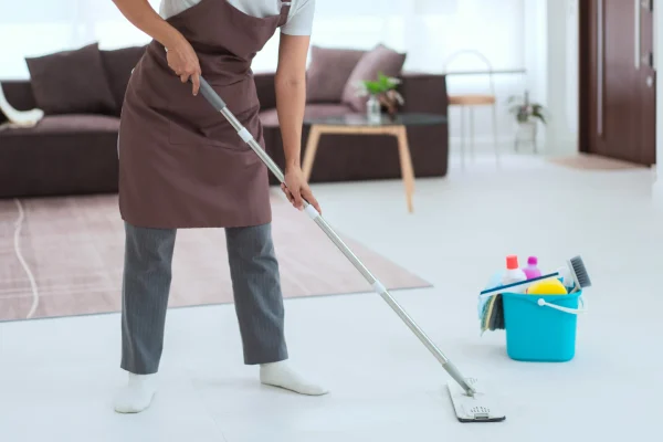 maid-using-cleaner-equipment-in-bucket-plastic-and-2025-03-09-18-20-58-utc_11zon